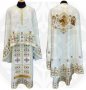 Luxurious priestly vestments, embroidered on a milky gabardine with covers